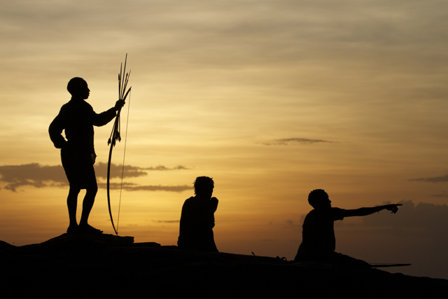 Hunters at sunset