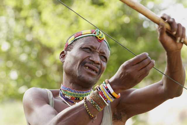 Hadzabe Man testing his bow.